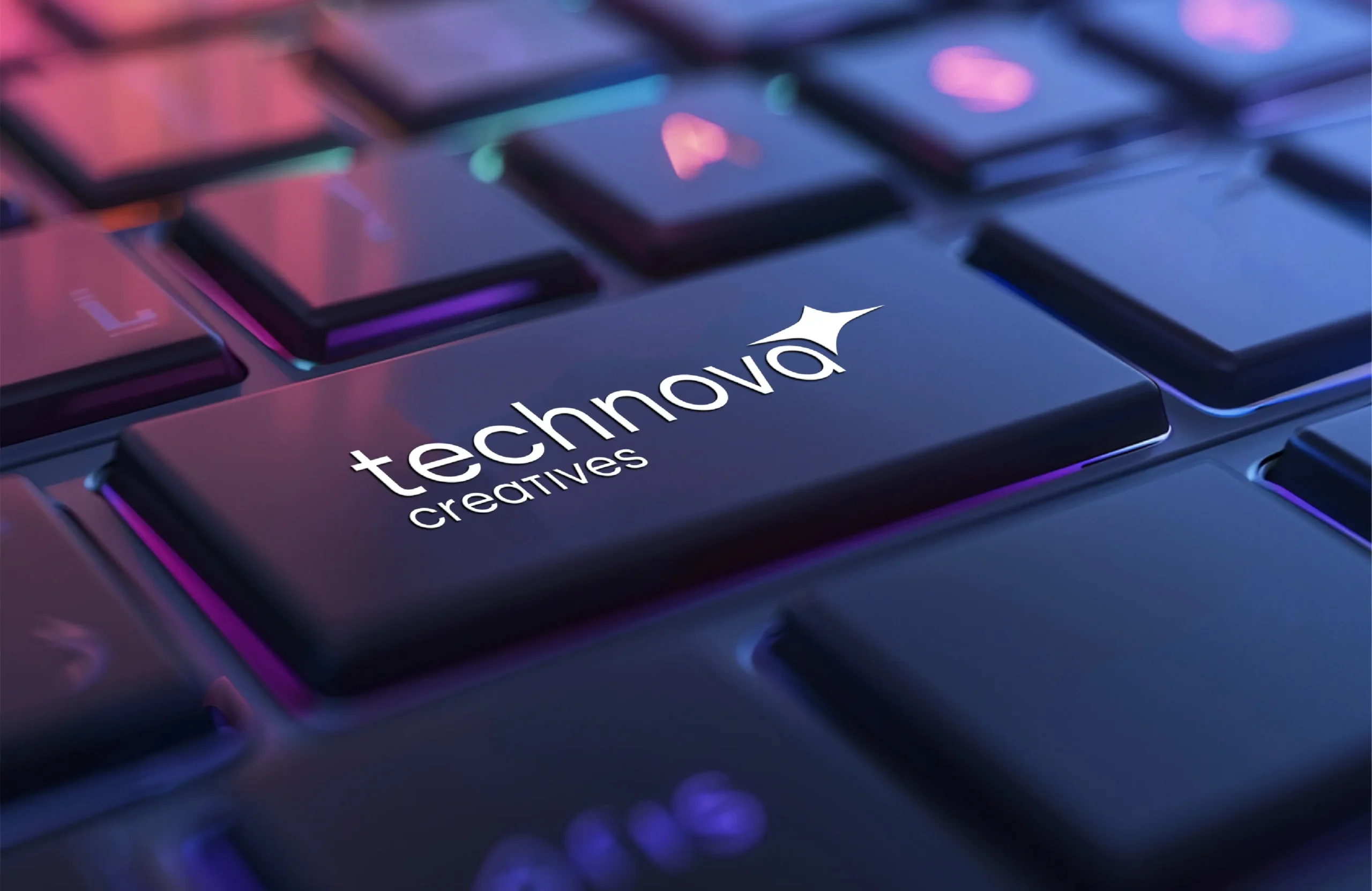 Technova Creatives logo design displayed on illuminated keyboard representing digital innovation branding