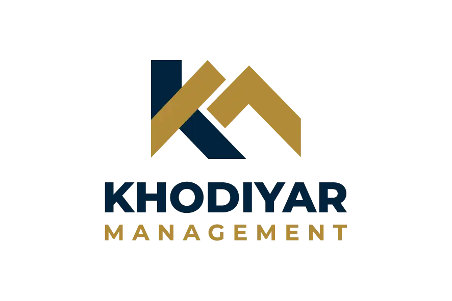 Khodiyar Management logo with navy and gold roof-style monogram
