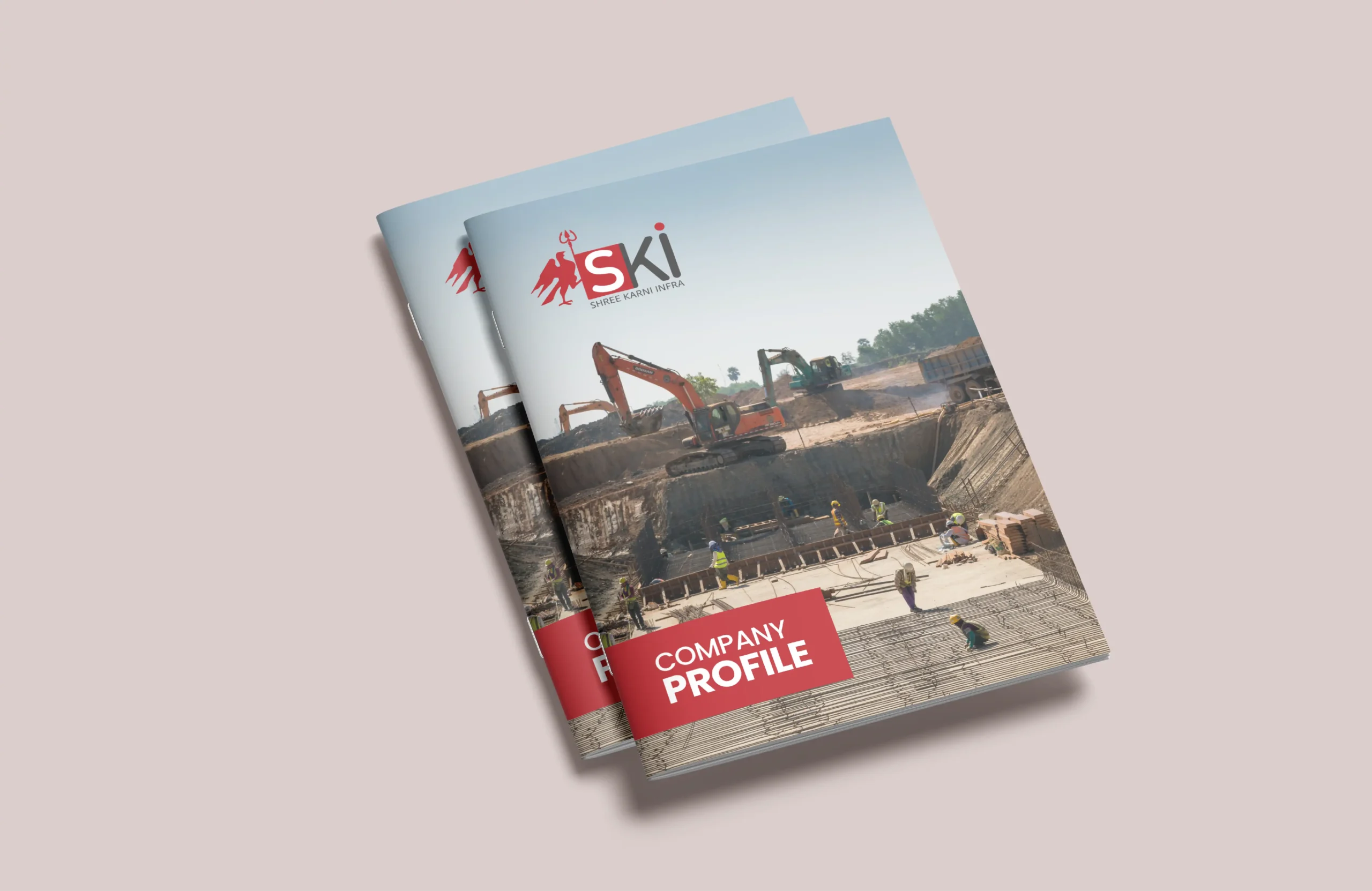Corporate brochure cover design for Shree Karni Infra featuring construction site visuals, excavation work and a bold company profile layout.