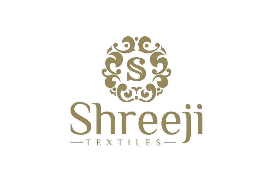 Shreeji Textiles logo in gold with decorative crest.