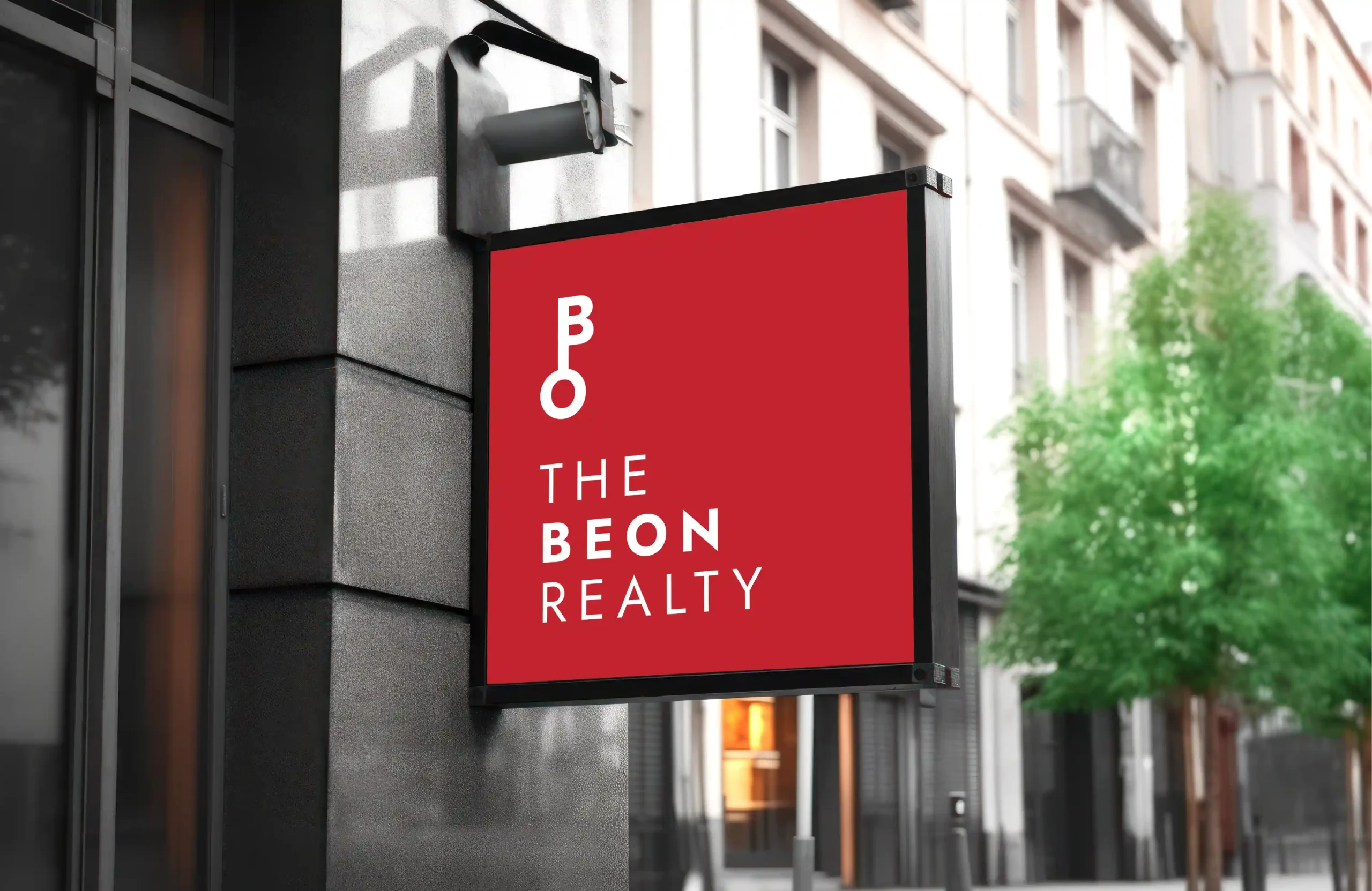 Outdoor signboard mockup for The Beon Realty with modern real estate logo design and branding