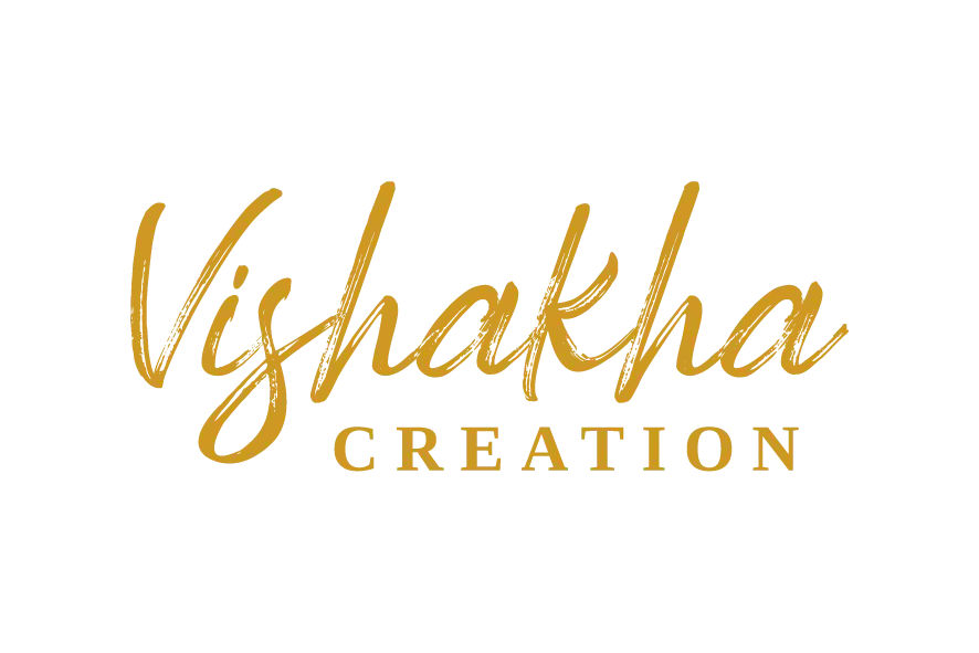 Vishakha Creation logo in gold script with serif text below.